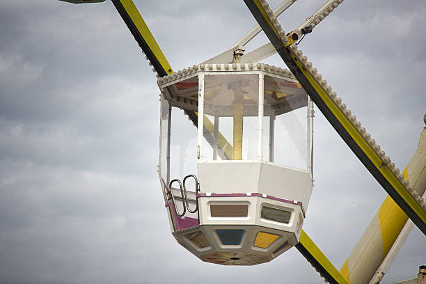 Entertainment industry. Sunday holiday Rides. Ferris wheel, big wheel metal construction