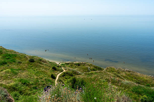the village of Rybakivka in the Mykolaiv region of Ukraine, offering a serene coastal landscape and natural beauty.