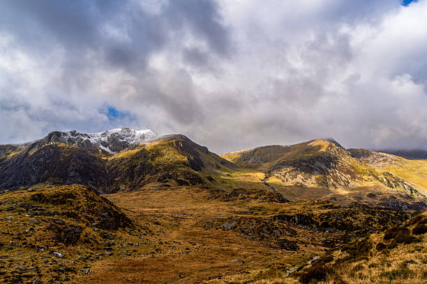 istock Dramatic Mountain Landscape in Snowdonia, Wales Under a Moody Sky 2228244987