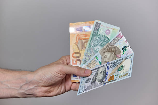 istock Mixed World Currencies. USD, EUR, PLN, ILS Banknotes 2228247456