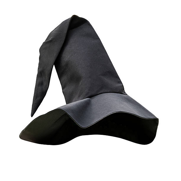 istock Halloween witch magic wizard hat in black isolated on white background with clipping path for Autumn seasonal festive holiday evil sorcerer alchemist costume dress 2228253738