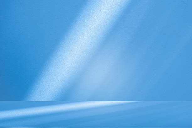 istock Studio style background wall decoration presentation uses white and blue tones. with shadows cast from a nearby window, concept creating a decorative 2228256171