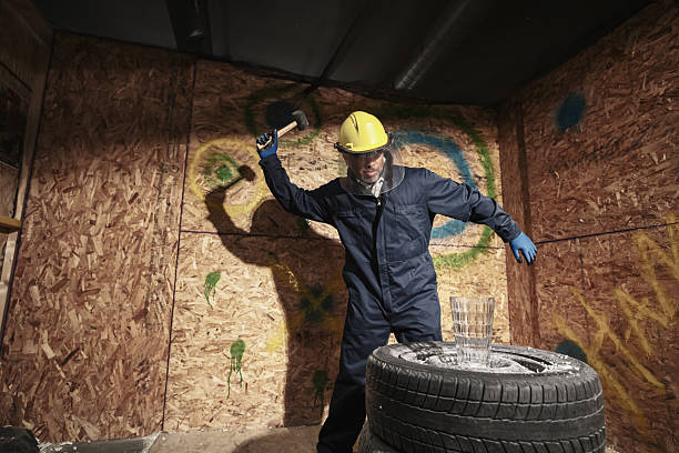istock Hispanic mature man  breaking stuff inside rage room 2228258711