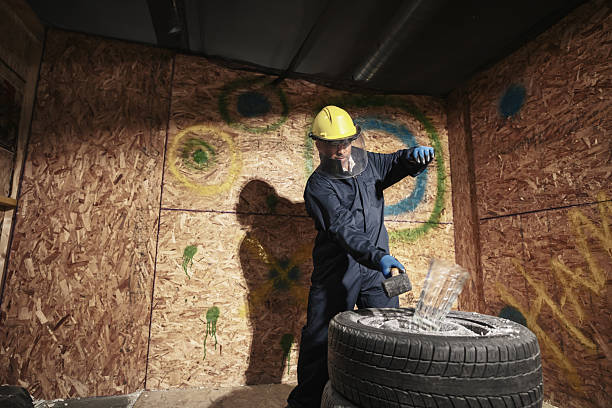 istock Hispanic mature man  breaking stuff inside rage room 2228258717