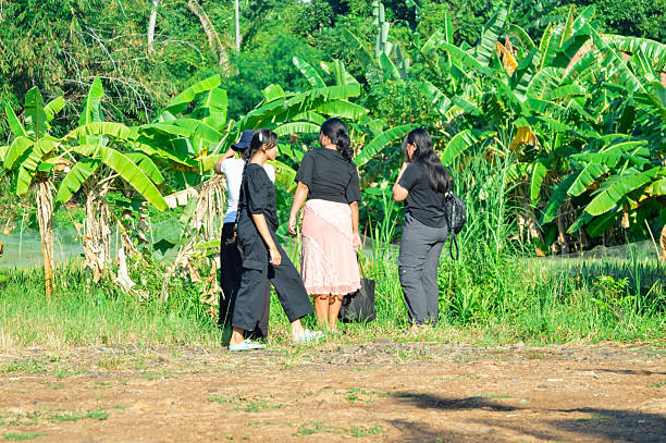 istock Girls explore plantation trail while enjoying the calm air 2228263312