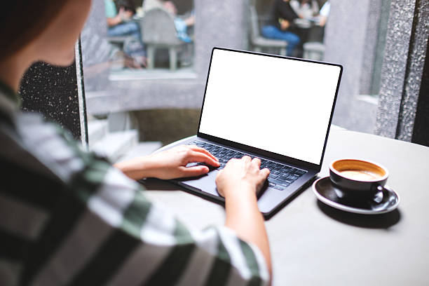 istock Mockup image of a woman working and typing on laptop computer with blank white desktop screen in cafe 2228265821
