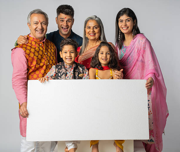 istock Family with blank poster on white background during Diwali 2228269018