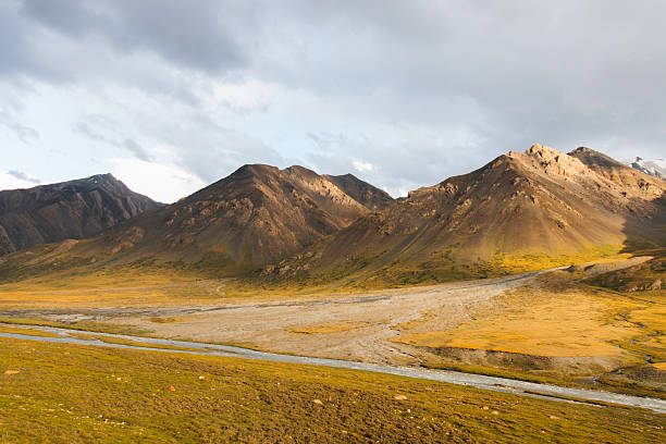 istock Panoramic view of a mountain valley with a river 2228269574