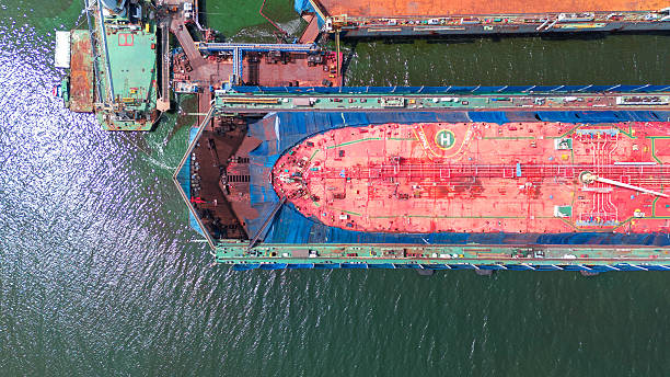 istock cargo container ship at dry dock concept maintenance service working in the sea. Insurance and Maintenance Cargo Ship concept. Freight Forwarding Service maintenance 2228273076