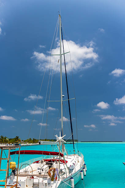 istock Sailing yacht docked clear blue water. 2228275222