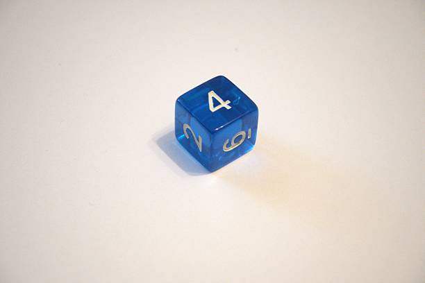 istock Blue dice with number 4 and white background 2228275746