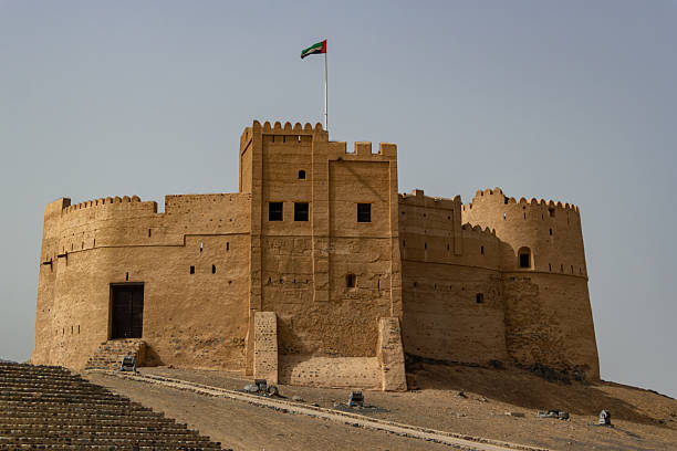 istock Grand Desert Fort on Hill with Waving Flag 2228276607