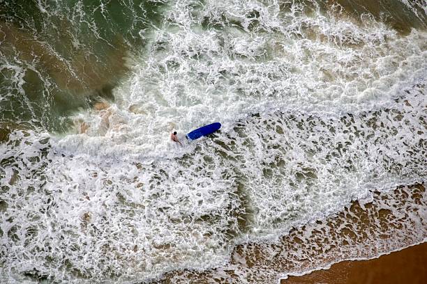People learning to surf at Surfers Paradise Main Beach in Gold Coast, Queensland, Australia. The Gold Coast is famous for its stunning beaches, and its excellent surfing conditions. (Photo by Tara Chand Malhotra)