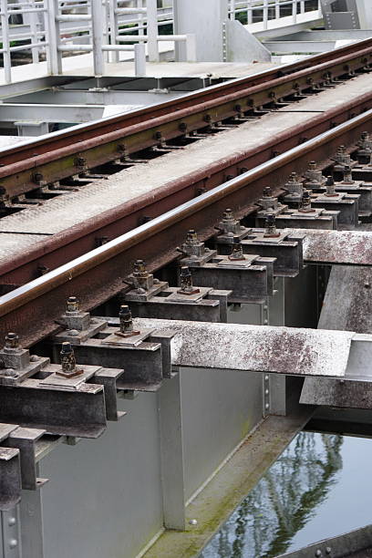 istock A section of a railway bridge, specifically focusing on the track structure and its support system 2228277819