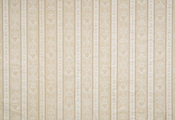 istock Old wallpaper on the wall. Old wallpaper for texture or background. 2228278129