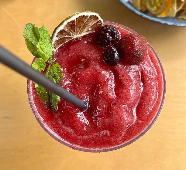 istock Refreshing Red Berry Coctail with Lime and Mint Garnish 2228280711