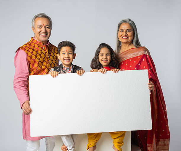 istock Family with blank poster on white background during Diwali 2228284691