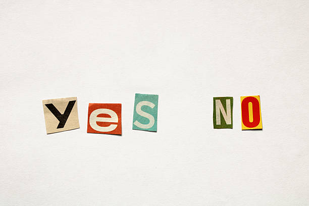 istock Yes and no words cut from magazines spelling decision 2228286324