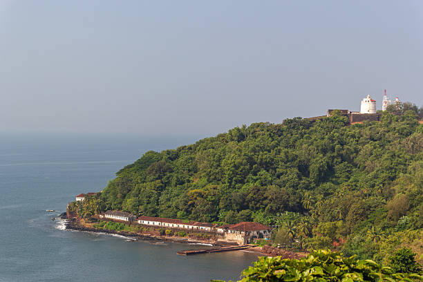 istock Coastal hillside view with buildings and sea in Goa 2228288830