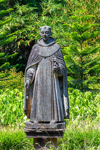 istock Monk statue amidst lush Goan greenery 2228288935