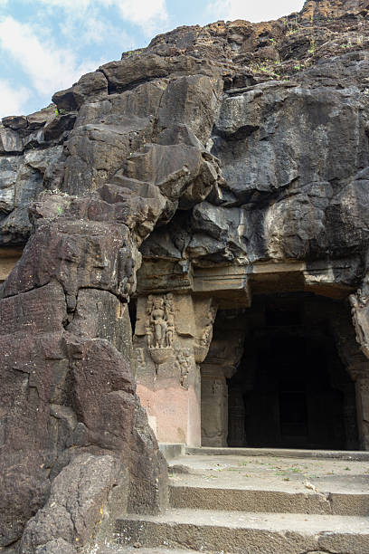 istock Entrance to Ancient Rock-Cut Cave Temple 2228291076
