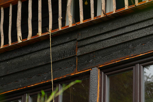 istock A sturdy rope is securely hanging from the side of a tall building 2228291152