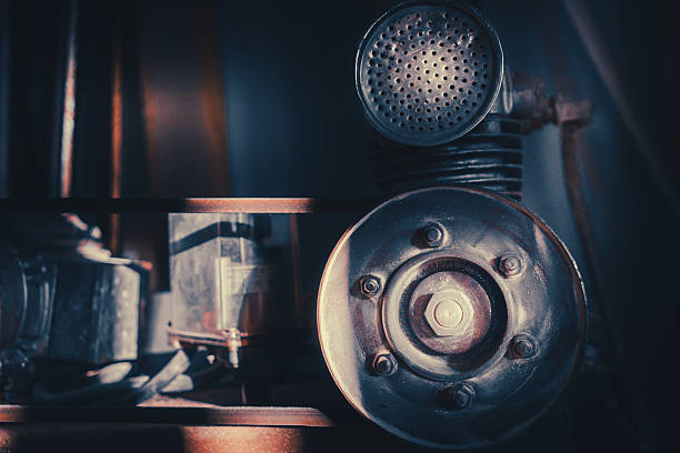 Details of old air compressor, close up view, conceptual composition.