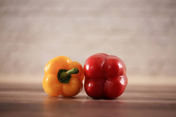 The color pepper is on the cutting board