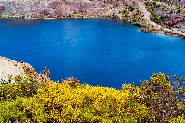 istock Turquoise Waters of Triadas Lake in Larko Mining Site Evia 2228292556