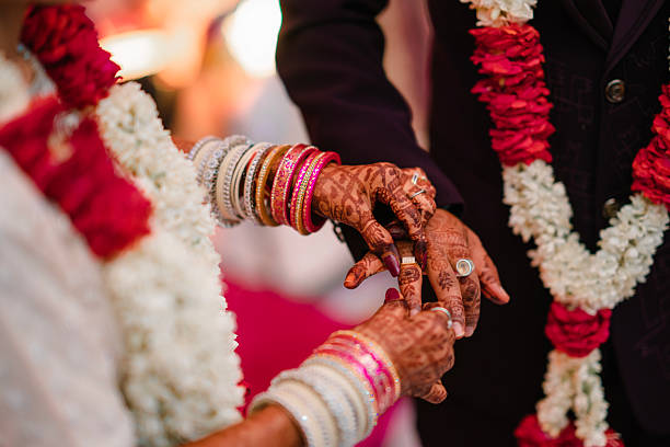 istock Bride and Groom Ring Exchange During Indian Wedding Ceremony 2228295452