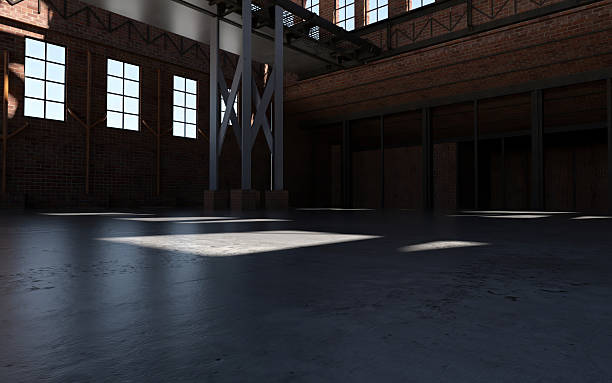 istock Empty Industrial Building with High Ceilings and Large Windows 2228295725