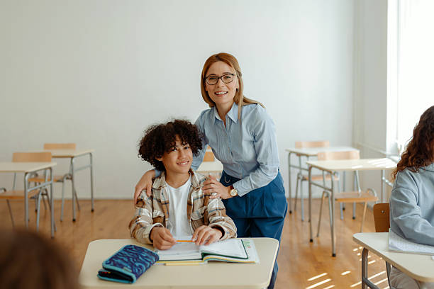 istock Student and Teacher Portrait in Elementary School 2228295940