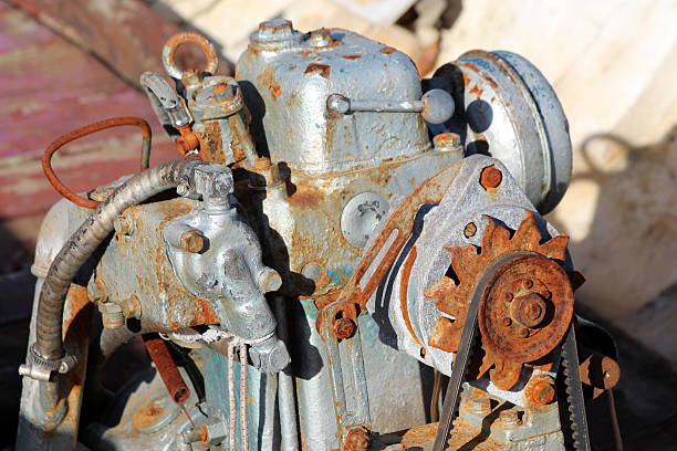 istock Close-up of rusty, weathered mechanical engine parts 2228299066