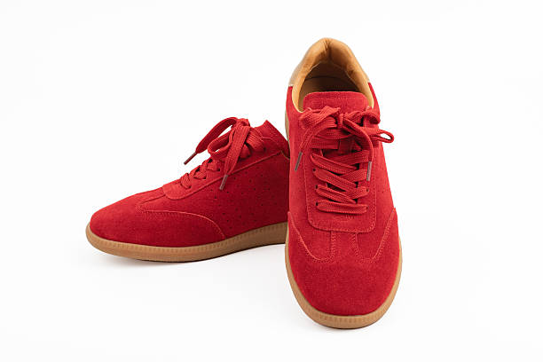 red suede sports-style winter boots, isolated