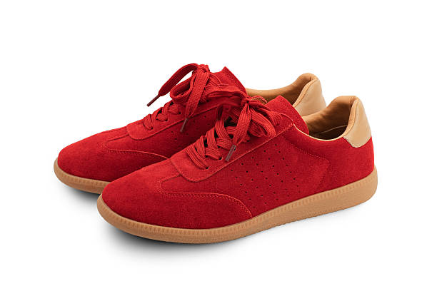 istock red suede sports-style winter boots, isolated 2228300407
