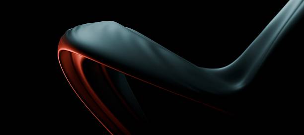 istock Smooth, flowing shapes with a sleek metallic texture, curving gracefully on a black background 2228304774