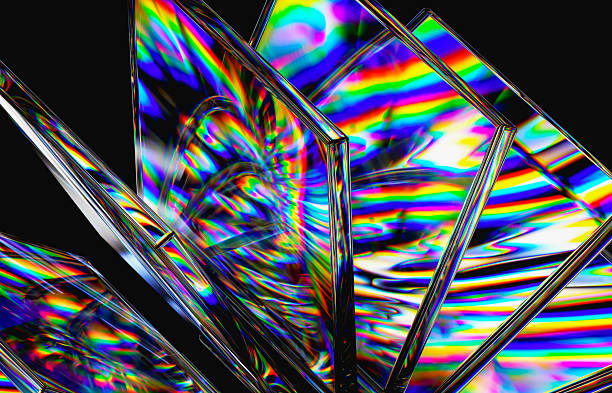istock Abstract transparent glass shards refracting vibrant rainbow light on dark background. 3d rendering 2228306315