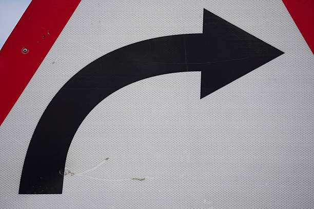 istock A traffic sign indicating a right turn or a right curve ahead 2228308460