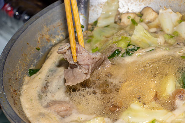 istock A traditional Suki soup - Sukiyaki in a pot 2228315796