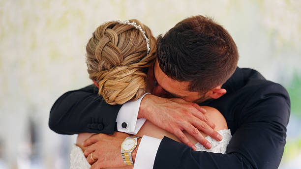 istock Newlywed bride and groom hugging each other 2228321497