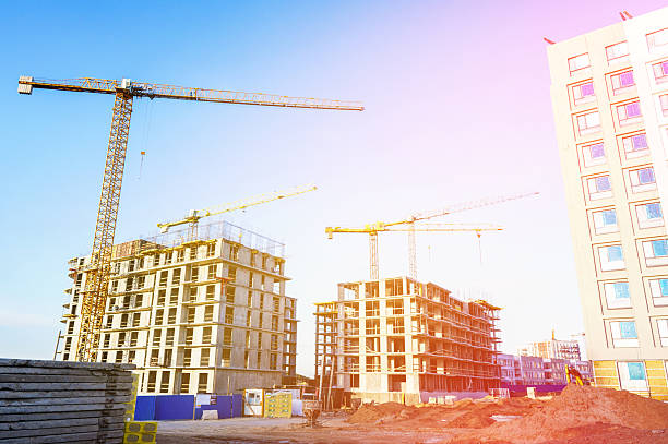 istock Tower crane on apartment Construction. Block House building construction. 2228323471