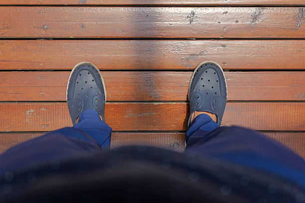 Men Standing on the Hardwood Floor