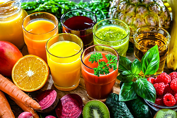 istock Glasses with fresh organic vegetable and fruit juices 2228326537