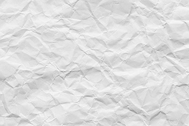 istock White crumpled paper backdrop,white crumpled paper texture background,Clean white paper, wrinkled, abstract background. 2228332891