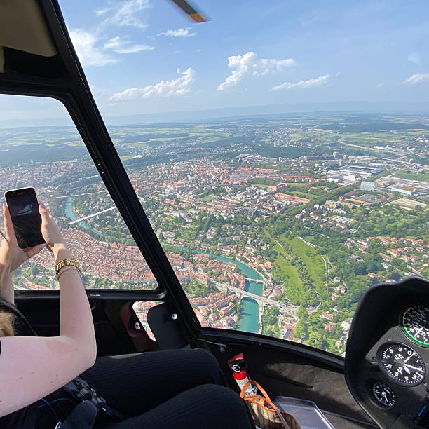 istock Alpine helicopter flies over mountains, cockpit view 2228333476