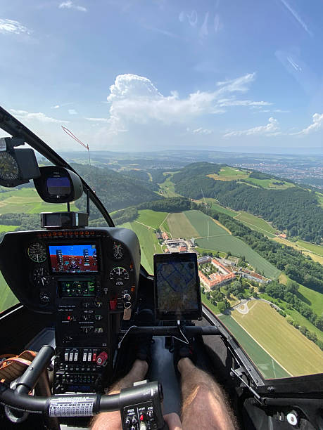 istock Alpine helicopter flies over mountains, cockpit view 2228333477