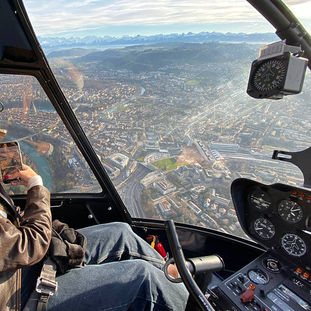 istock Alpine helicopter flies over mountains, cockpit view 2228333483
