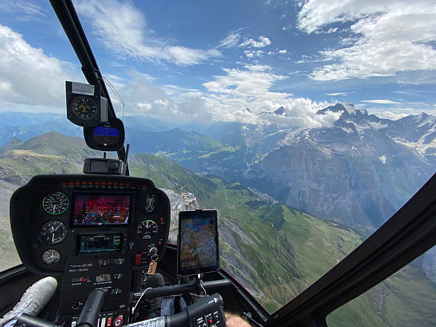 istock Alpine helicopter flies over mountains, cockpit view 2228333612