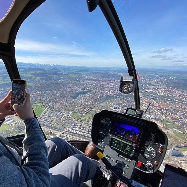 istock Alpine helicopter flies over mountains, cockpit view 2228333672