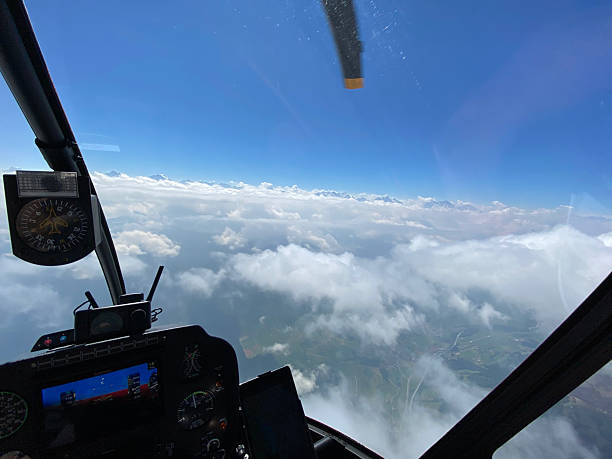 istock Alpine helicopter flies over mountains, cockpit view 2228334181